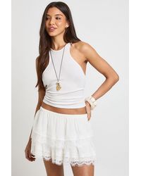 Boohoo - Lace Trim Flippy Mini Skirt - Lyst