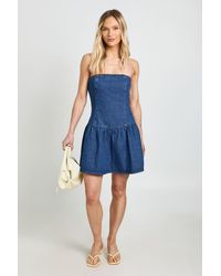 Boohoo - Petite Denim Bandeau Dropped Hem Dress - Lyst