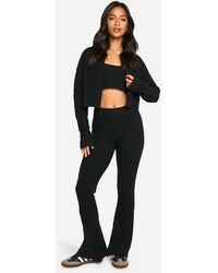 Boohoo - Petite Soft Cable Knitted Cardigan, Crop Top And Flare Leg Trouser 3 Piece Set - Lyst