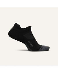Feetures - Elite Max Cushion No Show Tab Socks Spandex - Lyst