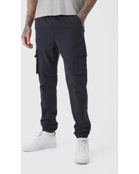 BoohooMAN - Tall Slim Fit Elasticated Waist Cuffed Cargo Trousers - Lyst