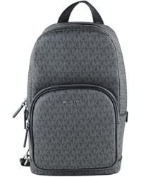 Michael Kors - Cooper Medium Signature Pvc Commuter Slingpack Crossbody Bag Signature) - Lyst