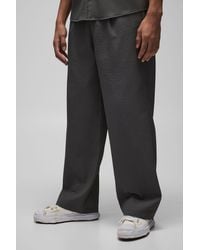 BoohooMAN - Straight Fit Technical Pleated Half Fixed Waistband Pants - Lyst