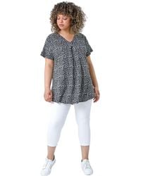 Roman Curve - Pleat Front Printed V-Neck Stretch Top - Lyst