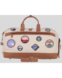 Fenland Sheepskin - Heritage Canvas Travel Holdall With Adventure Patches - Lyst