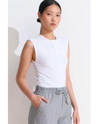 Dilvin - Sleeveless Ribbed Button-Front Blouse - Lyst