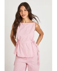 Boohoo - Boat Neck Stripe Tie Side Peplum Top - Lyst