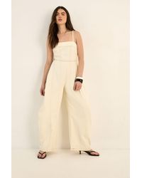 Nasty Gal - Strappy Seam Detail Wide Leg Denim Jumpsuit - Lyst