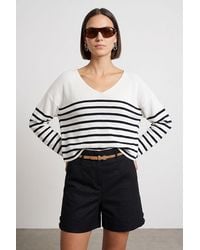 Dilvin - Striped V-Neck Ribbed Knit Sweater - Lyst