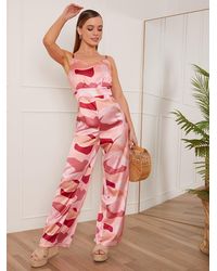 Chi Chi London - Petite Sleeveless Floral Jumpsuit - Lyst