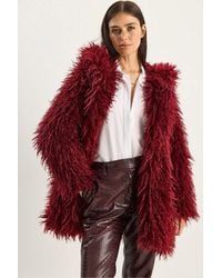 Bianco Lucci - Oversize Hooded Faux Fur Jacket - Lyst