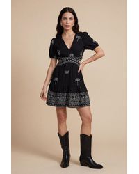 Urban Bliss - Open Back Tirered Mini Dress Pattern - Lyst