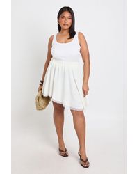 Boohoo - Plus Textured Lace Trim Asymmetric Mini Skirt - Lyst