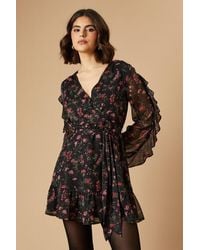 Oasis - Floral Printed Ruffle Sleeve Bow Detail Mini Dress - Lyst