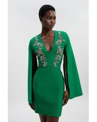 Karen Millen - Bandage Form Fitting Cape Sleeve Embellished Mini Dress - Lyst