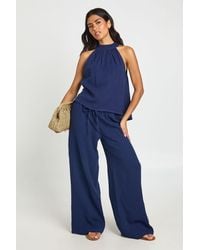 Boohoo - Cheesecloth Low Rise Drawcord Wide Leg Trousers - Lyst