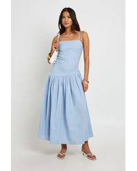 Boohoo - Linen Ruched Drop Hem Midi Skater Dress - Lyst