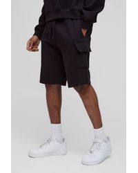 BoohooMAN - Tall Loose Fit Mid Length Cargo Shorts - Lyst