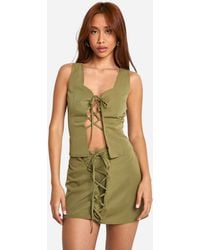 Boohoo - Lace Up Front Mini Skirt - Lyst