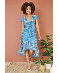 Mela London - Ditsy Print Sun Dress With Cross Over Back Tie Front And Dip Hem Viscose - Lyst