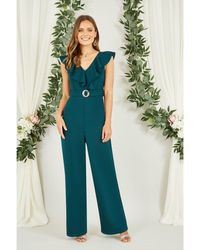Mela London - Jumpsuit With Buckle And Frill Detail - Lyst