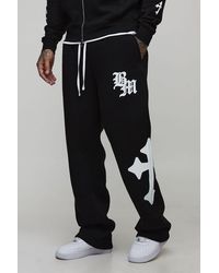 BoohooMAN - Tall Baggy Gothic Bm Cross Print Joggers - Lyst
