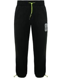 PUMA - X Helly Hansen Stretch Wst Polar Fleece Joggers Bottoms 598288 01 - Lyst