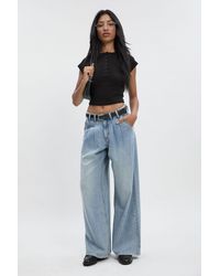 Boohoo - High Waist Supersoft Belted Pleated Wide Leg Jeans - Lyst