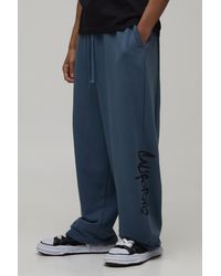 BoohooMAN - Balloon Fit Contrast Stitch California Printed Loopback Jogger - Lyst