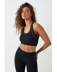 DSGN Studio - Reflective Binding Sculpt Sports Bra - Lyst
