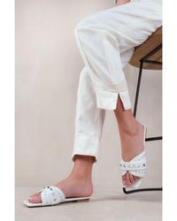 Where's That From - 'Saturn' Double Cross Over Strap Flat Sandals With Stud Details - Lyst