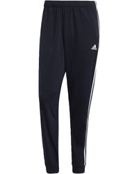 adidas - Essentials Warm-Up Tapered 3-Stripes Track Pants - Lyst