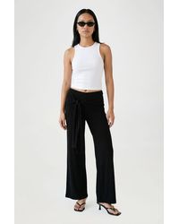 Boohoo - Tie Waist Flare Trouser - Lyst