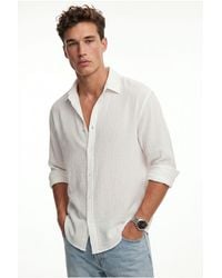 Bianco Lucci - Oversized Textured Button-Front Shirt - Lyst