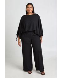Boohoo - Plus Textured Ruched Sleeve Balloon Hem Top & Wide Leg Trouser - Lyst