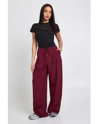Boohoo - Drawcord Nylon Pleat Front Wide Leg Trousers - Lyst