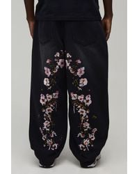 BoohooMAN - Floral Embroidered Balloon Fit Jeans - Lyst