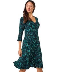 Roman - Wave Print Side Button Stretch Dress - Lyst