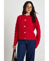Boohoo - Bow Button Detail Cable Knit Cardigan - Lyst