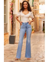 Sosandar - Light Wash Kick Flare Jeans - Lyst