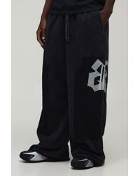 BoohooMAN - Extreme Wide Leg Embellished Washed Loopback Jogger - Lyst