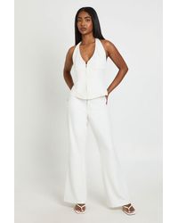 Boohoo - Zip Detail Flared Tailored Trousers - Lyst