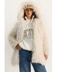 Bianco Lucci - Oversize Hooded Faux Fur Jacket - Lyst