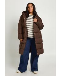 Boohoo - Plus Belted Longline Puffer Jacket - Lyst