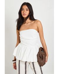 Boohoo - Bandeau Ruched Bust Peplum Bubble Hem Top - Lyst