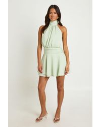 Boohoo - Textured Halterneck Drop Hem Mini Dress - Lyst