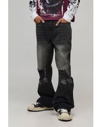 BoohooMAN - Straight Flared Rip & Repair Studded Jeans - Lyst