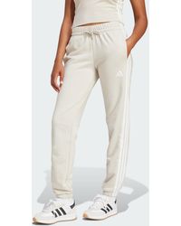 adidas - Essentials 3-Stripes French Terry Cuffed Pants - Lyst