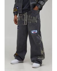 BoohooMAN - Studded Badge Detail Extended Drawcord Baggy Fit Jeans - Lyst