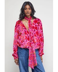 Warehouse - Devore High Neck Wrap Front Blouse - Lyst
